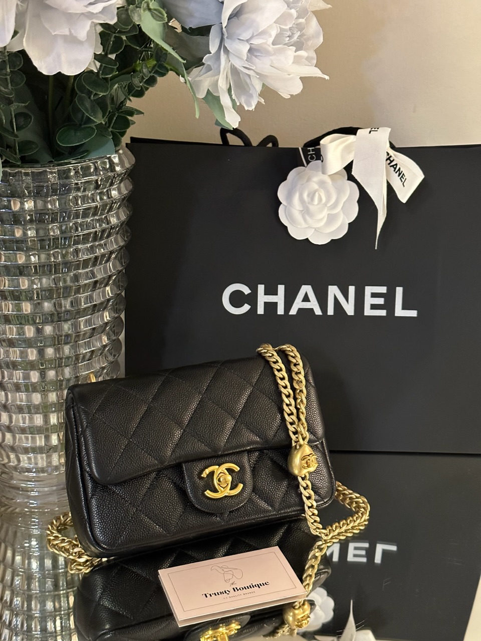 chanel bag with heart chain