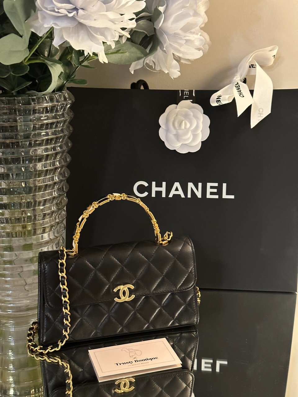 CHANEL Lambskin Quilted Top Handle Flap Clutch With Chain Black |  FASHIONPHILE